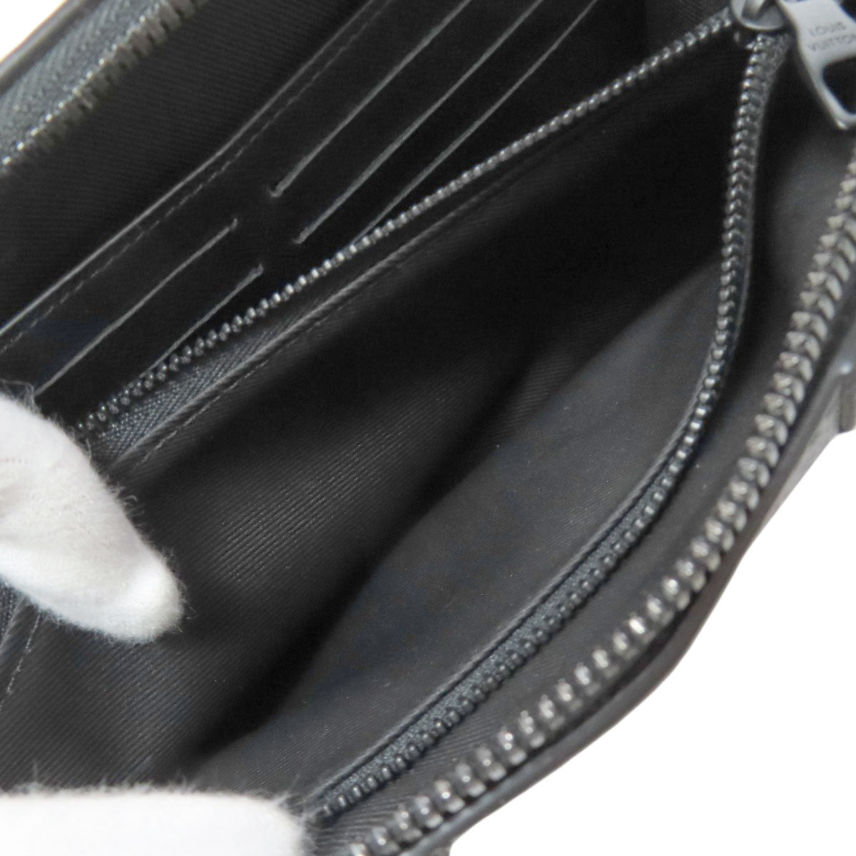 LOUIS VUITTON M69838 soft trunk wallet Long wallet (with coin pocket) Monogram Eclipse mens [Used]