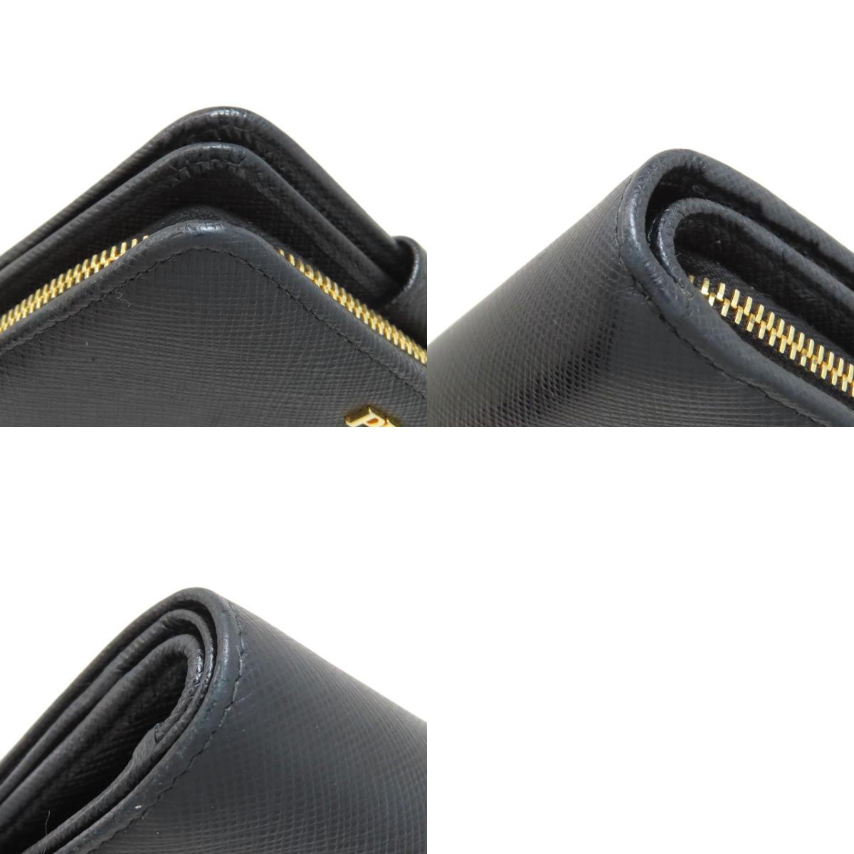 PRADA Triangle Charm Bifold Wallet with Coin Pocket Safiano Ladies [Used]