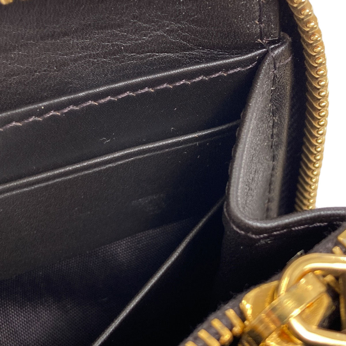 MIUMIU Embossing Long wallet (with coin pocket) Leather Ladies [Used]