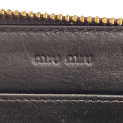 MIUMIU Embossing Long wallet (with coin pocket) Leather Ladies [Used]