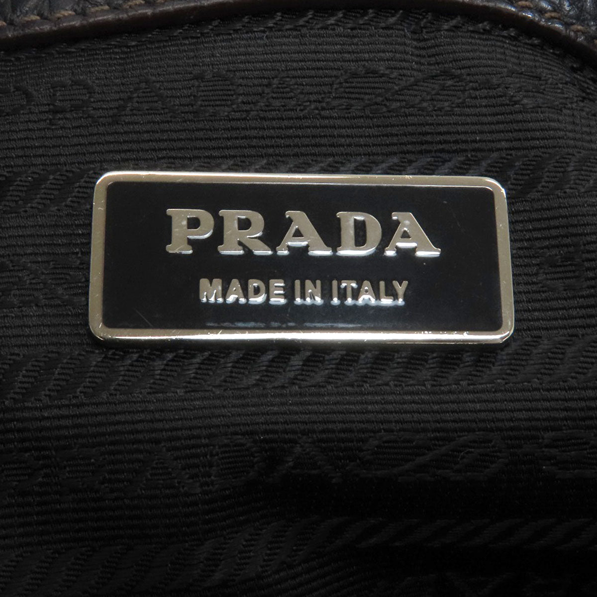 PRADA Embossed logo Handbag Leather Ladies [Used]